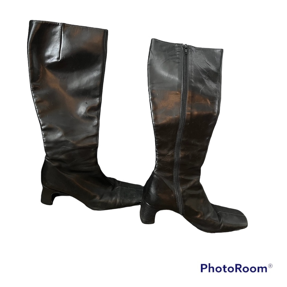 Tall knee high black boots